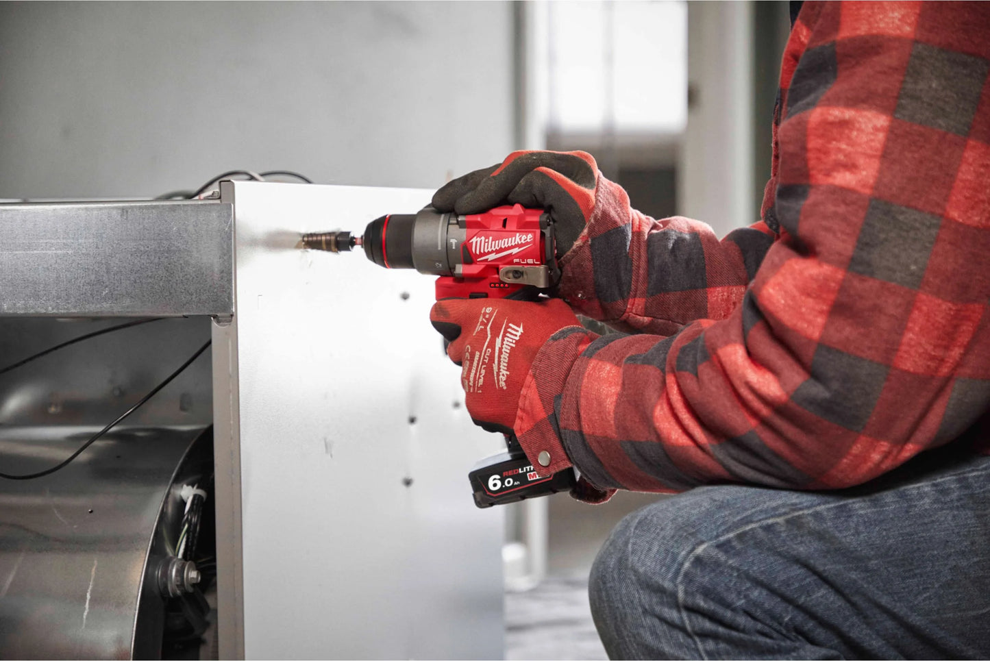 Pack d’outils : perceuse à percussion + visseuse à chocs + 2 batteries de 4,0 Ah + chargeur + mallette Milwaukee M12 FPP2A2-402X