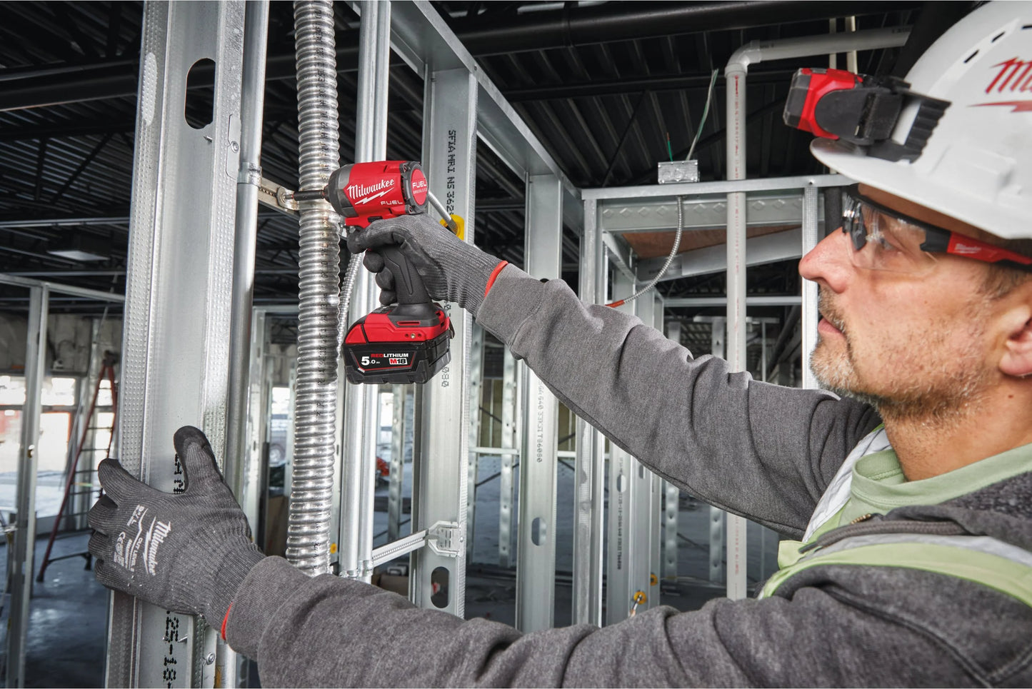 Visseuse à chocs M18 Fuel à emmanchement hexagonal ¼″ + 2 batteries 5 Ah + chargeur + mallette Milwaukee M18 FID3-502X